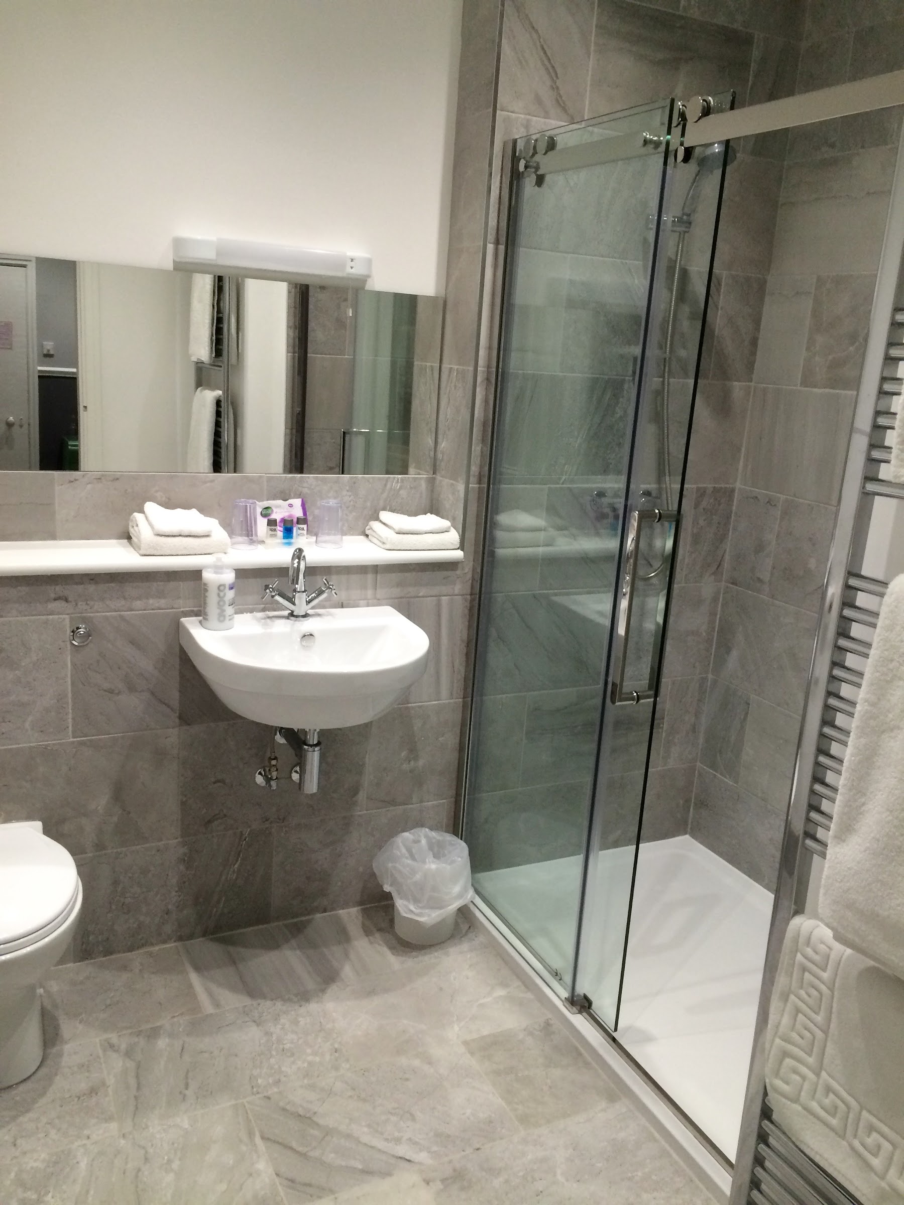 A modern en-suite shower room at the Dairy Guest House